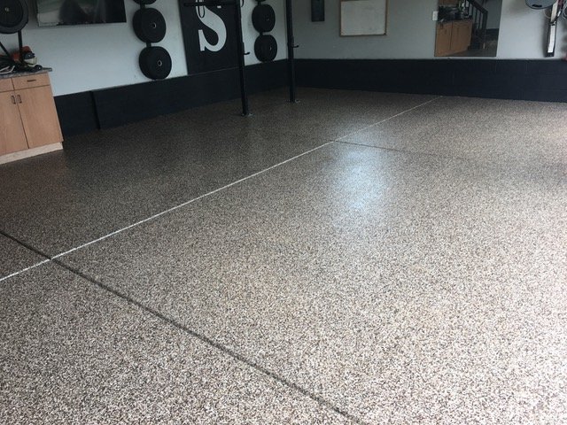 Flake epoxy garage floor with speckled finish