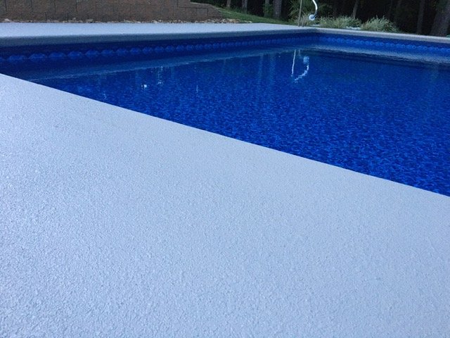 Textured pool deck coating